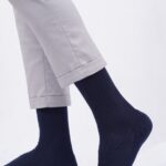 airgarb cotton comfort crew premium socks navy blue men women model leg wearing socks office