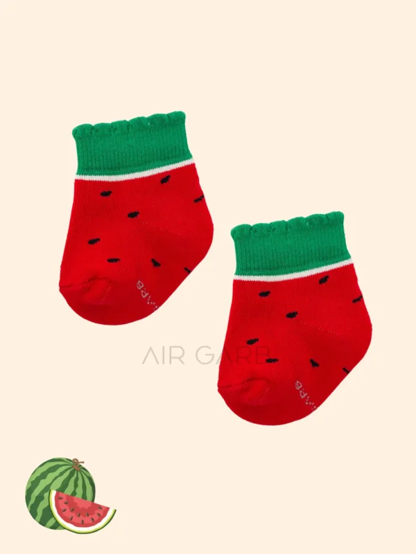 The playful designs feature watermelon slices, cherries, and pineapples, making this gift set perfect for active toddlers.