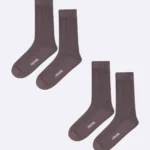 Premium cotton crew dress socks for men and women, featuring a sleek and stylish design, ideal for formal and everyday wear.